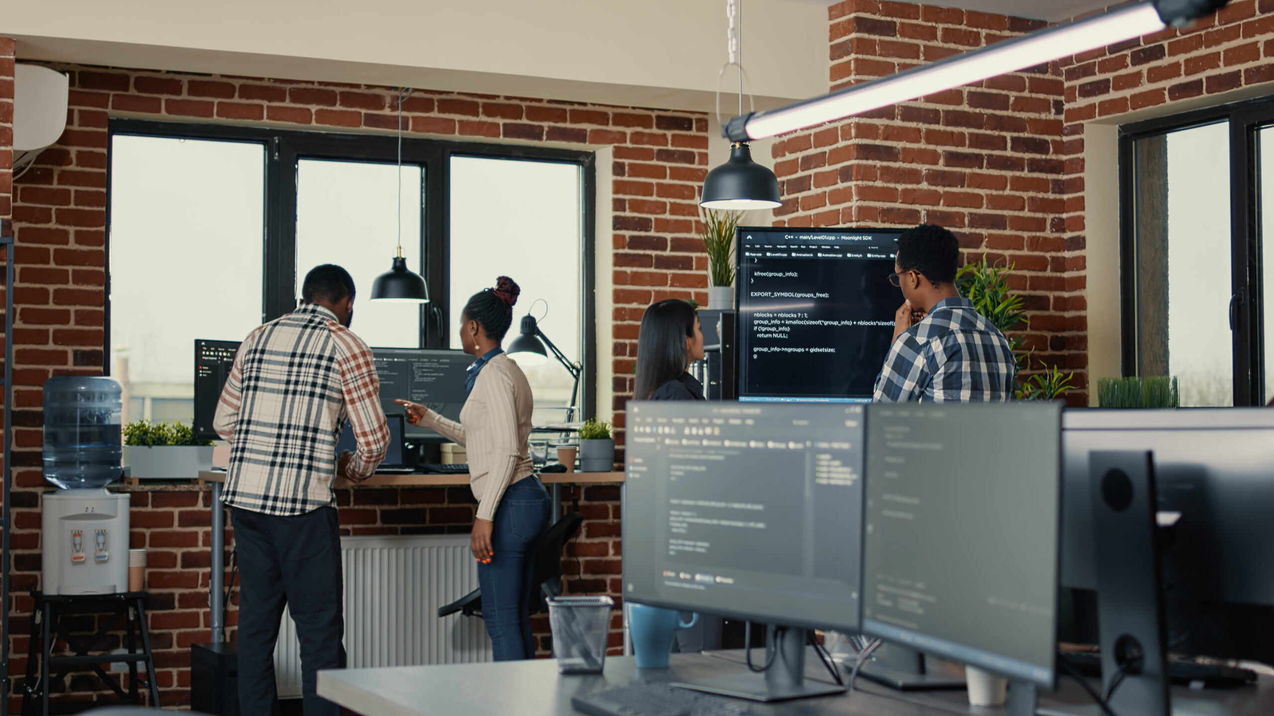 Offerings System Developers Analyzing Code Wall Screen Tv Looking Errors While Team Coders Collaborate Artificial Intelligence Project Programmers Working Together Machine Learning Software Scaled
